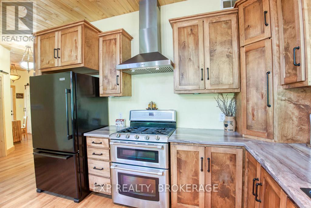 1249 Waters Edge Lane, Frontenac, Ontario K0H 1B0 - Photo 6 - X12635264