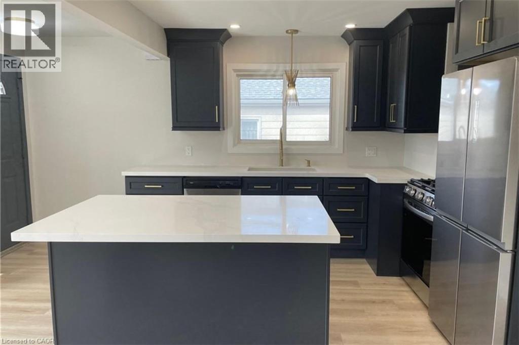 <div class="slider-price">$2,550 Monthly</div><p>564 Waterloo Street Unit# Main, Hamilton, Ontario</p>