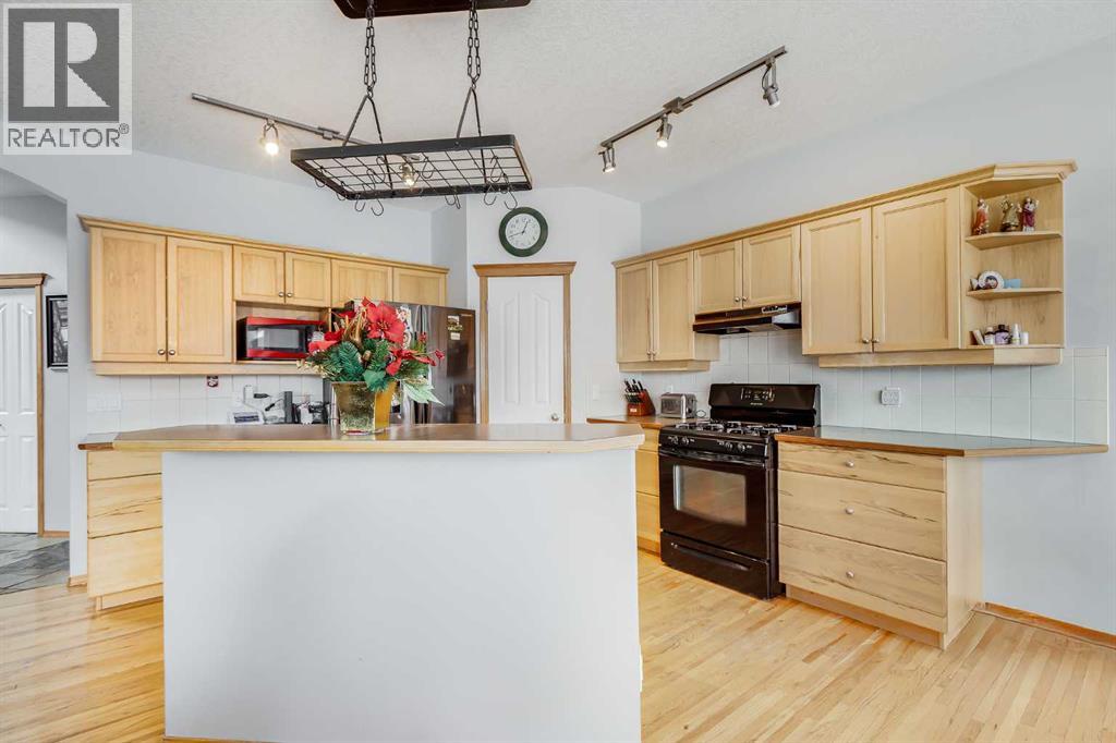 144 Bow Ridge Drive, Cochrane, Alberta  T4C 1V8 - Photo 5 - A2272332