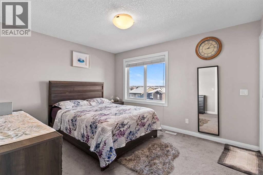 18 Evanscrest Heights Nw, Calgary, Alberta  T3P 0S3 - Photo 21 - A2274763