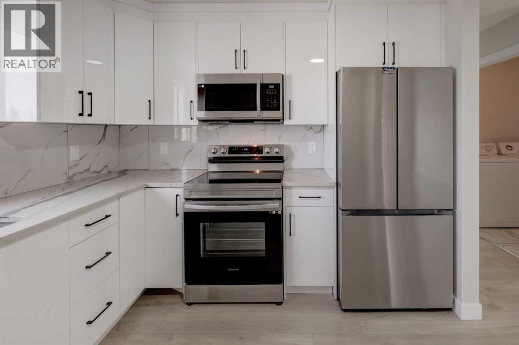 202 Falmere Way Ne, Calgary, Alberta  T3J 2Y1 - Photo 5 - A2264397