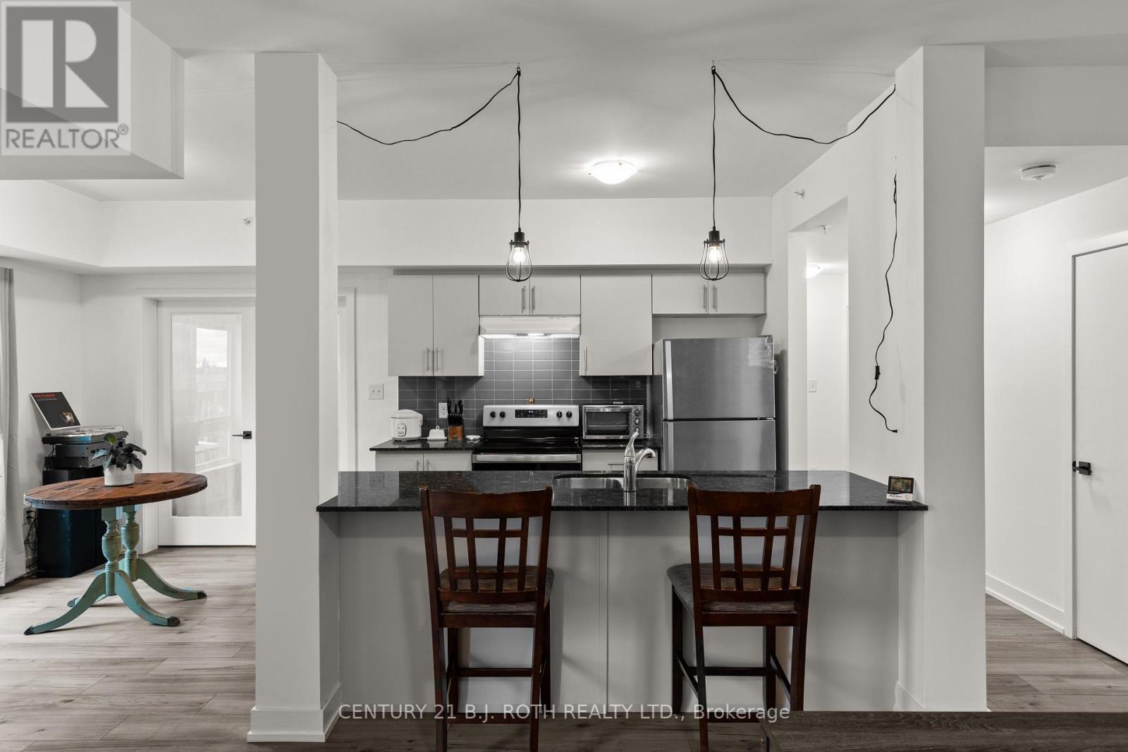 117 - 4 Spice Way, Barrie (Innis-Shore), Ontario L9J 0M2 - Photo 8 - S12635860