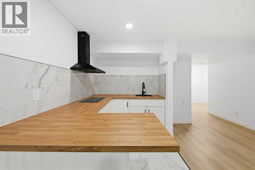 217 Coopers Grove Sw, Airdrie, Alberta  T2B 0G4 - Photo 34 - A2267001