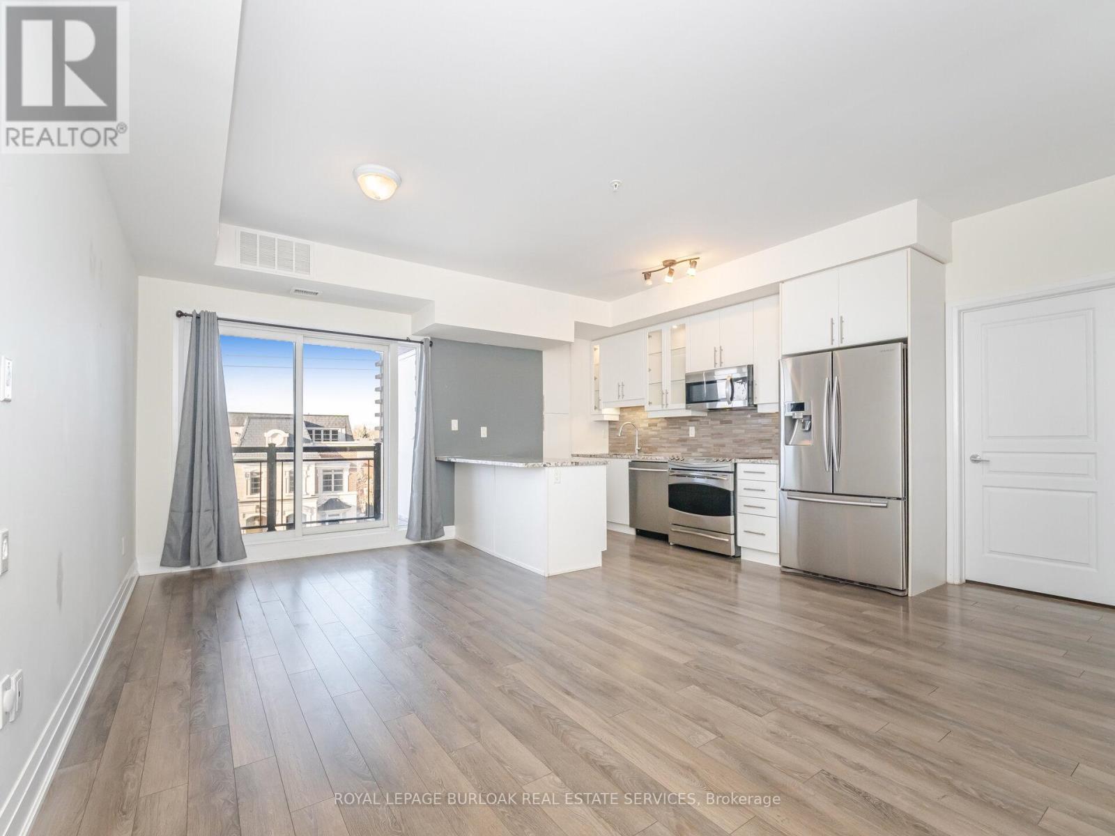 418 - 128 Garden Drive, Oakville, Ontario  L6K 0H7 - Photo 13 - W12636030