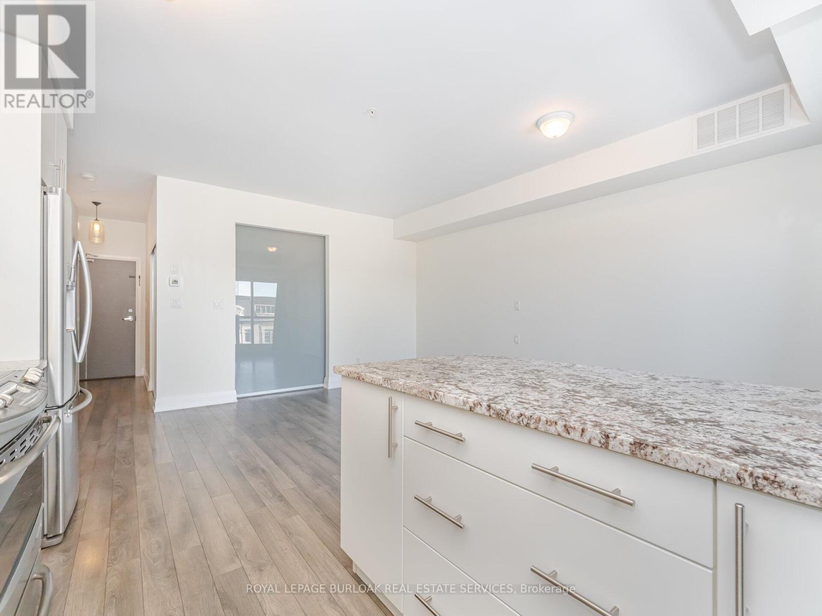 418 - 128 Garden Drive, Oakville, Ontario  L6K 0H7 - Photo 14 - W12636030