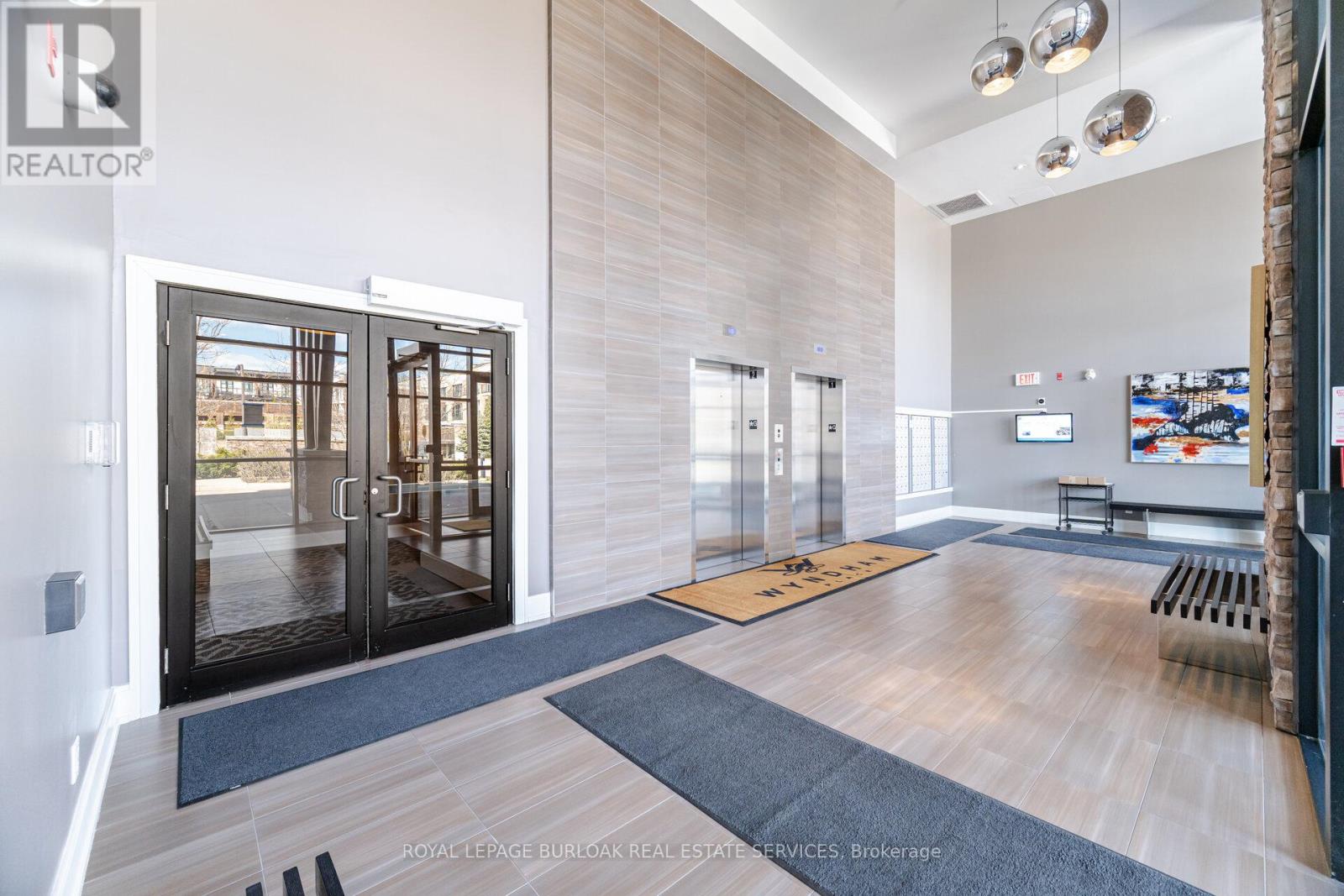 418 - 128 Garden Drive, Oakville, Ontario  L6K 0H7 - Photo 5 - W12636030