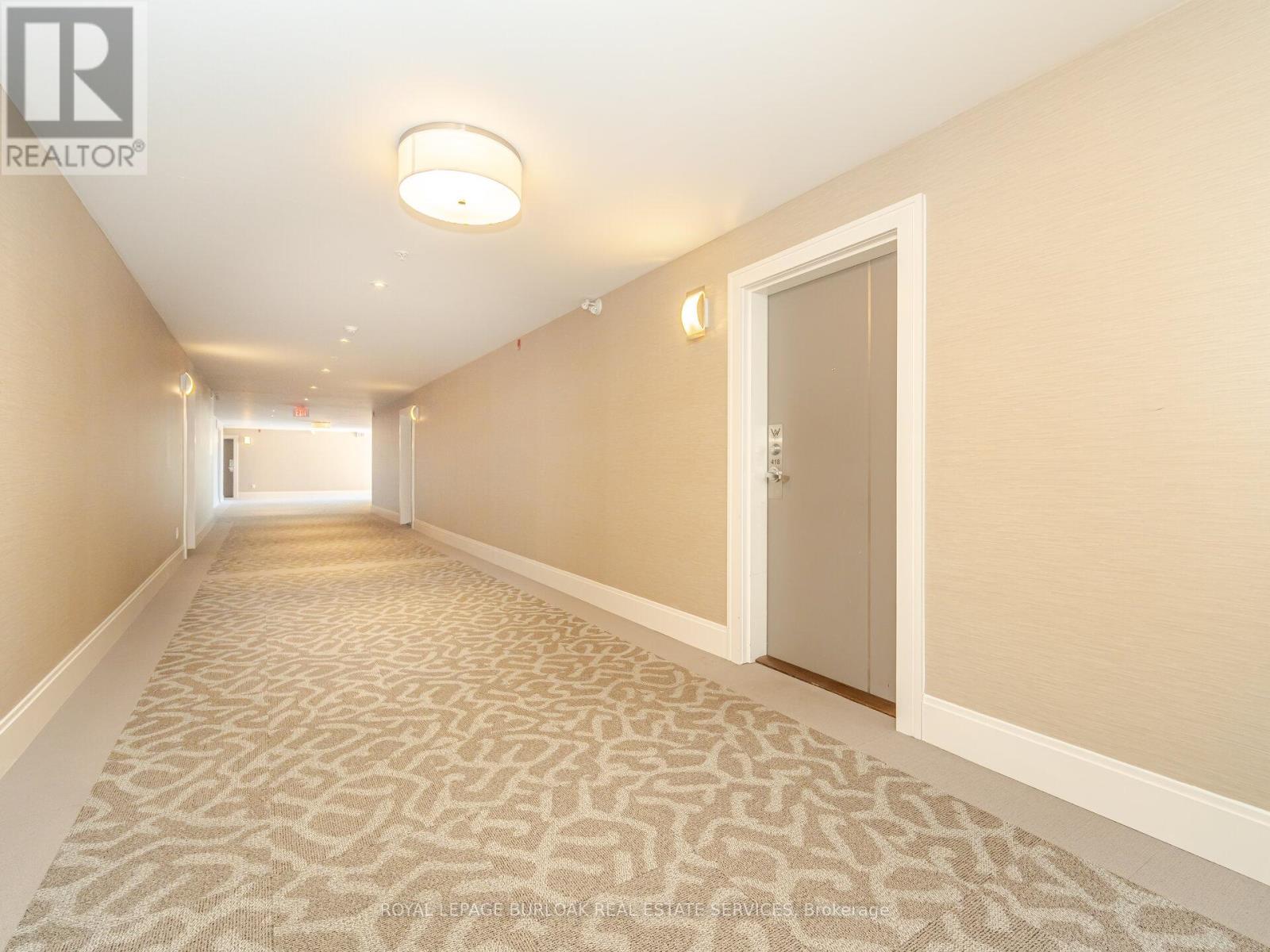 418 - 128 Garden Drive, Oakville, Ontario  L6K 0H7 - Photo 6 - W12636030