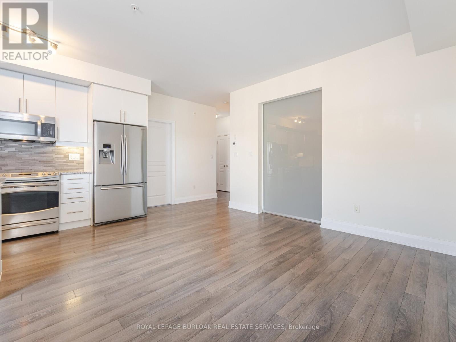 418 - 128 Garden Drive, Oakville, Ontario  L6K 0H7 - Photo 9 - W12636030