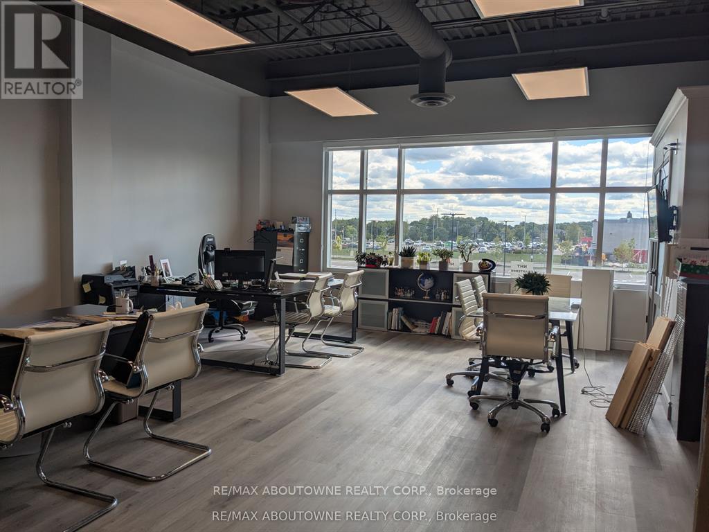 201 - 3475 Rebecca Street, Oakville (Qe Queen Elizabeth), Ontario  L6L 0H3 - Photo 3 - W12636144