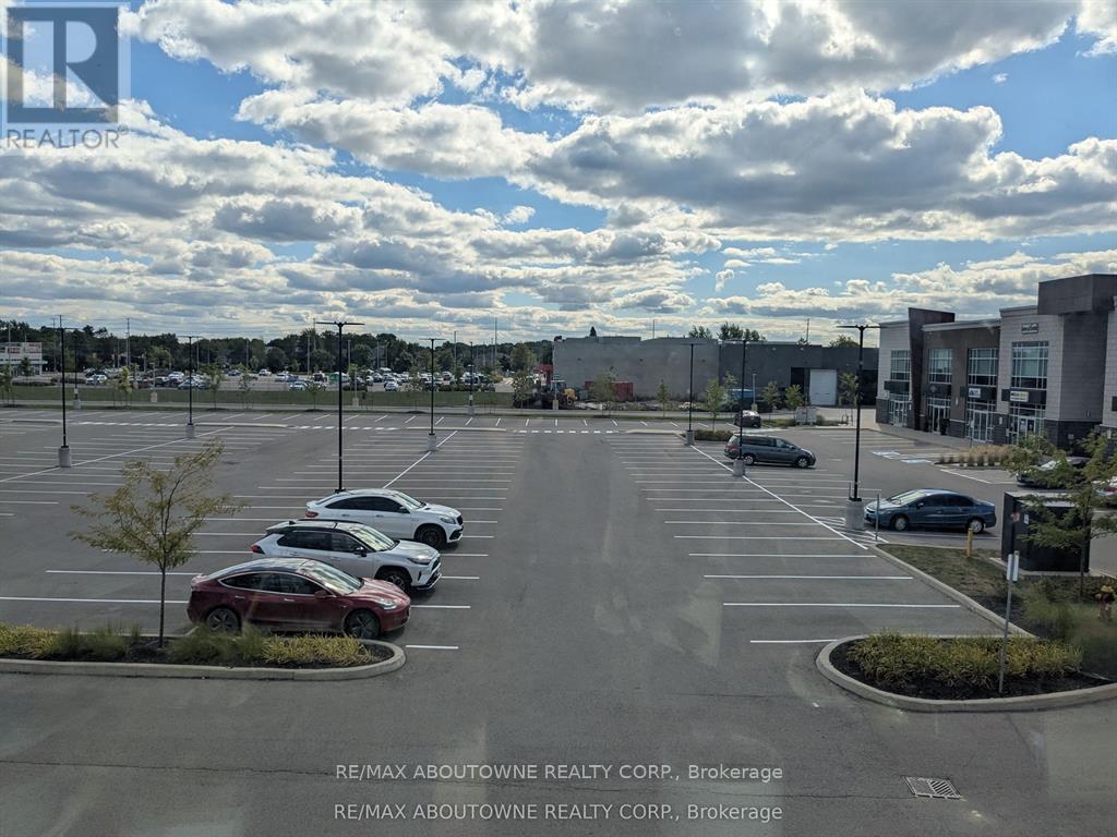 201 - 3475 Rebecca Street, Oakville (Qe Queen Elizabeth), Ontario  L6L 0H3 - Photo 5 - W12636144