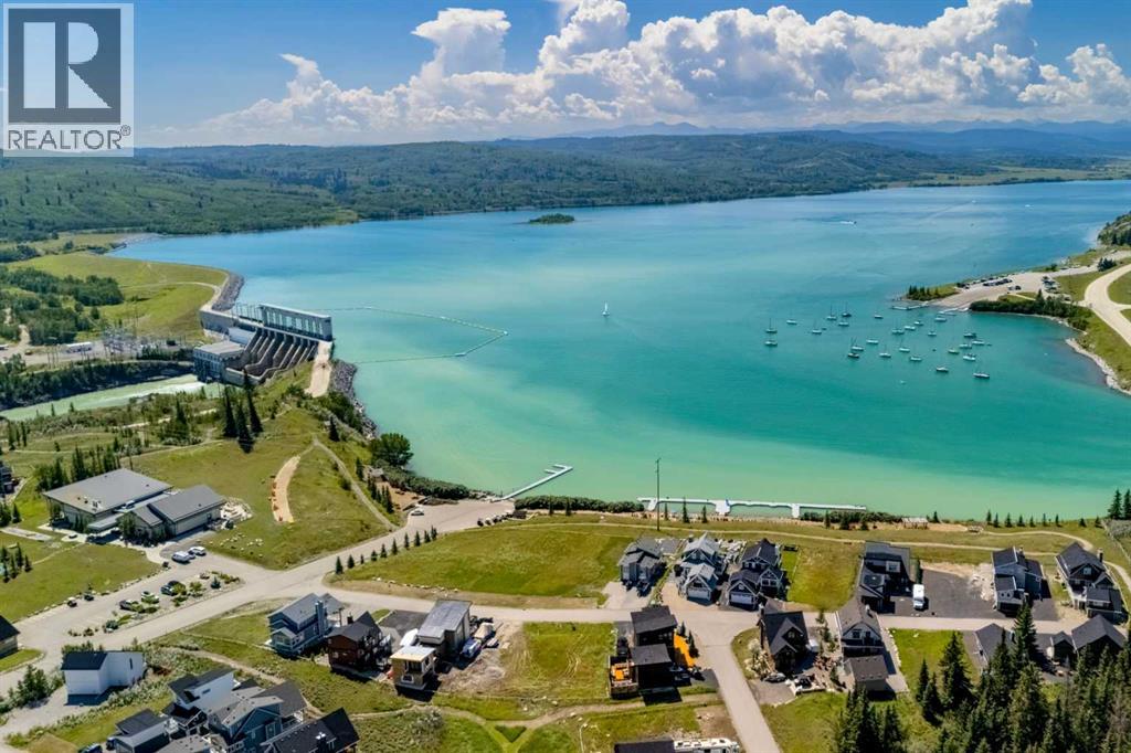 423 Cottageclub Cove, Rural Rocky View County, Alberta  T4C 1B1 - Photo 4 - A2268656