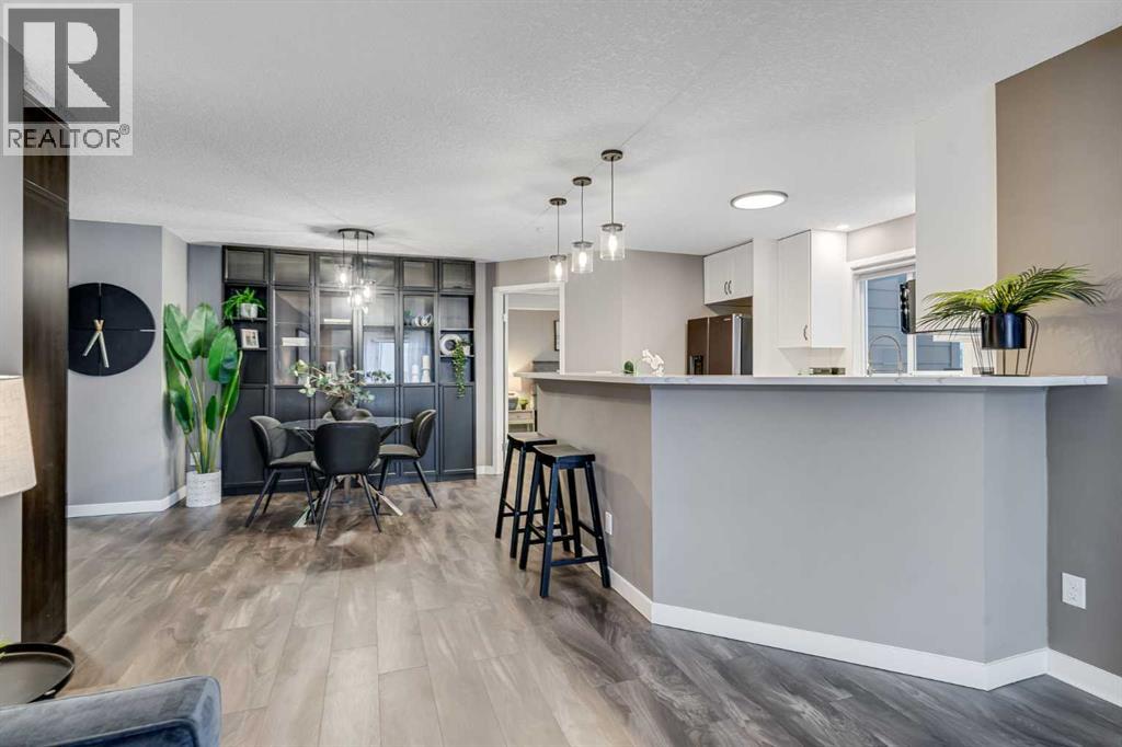 8128, 304 Mackenzie Way Sw, Airdrie, Alberta  T4B 3H8 - Photo 6 - A2274092