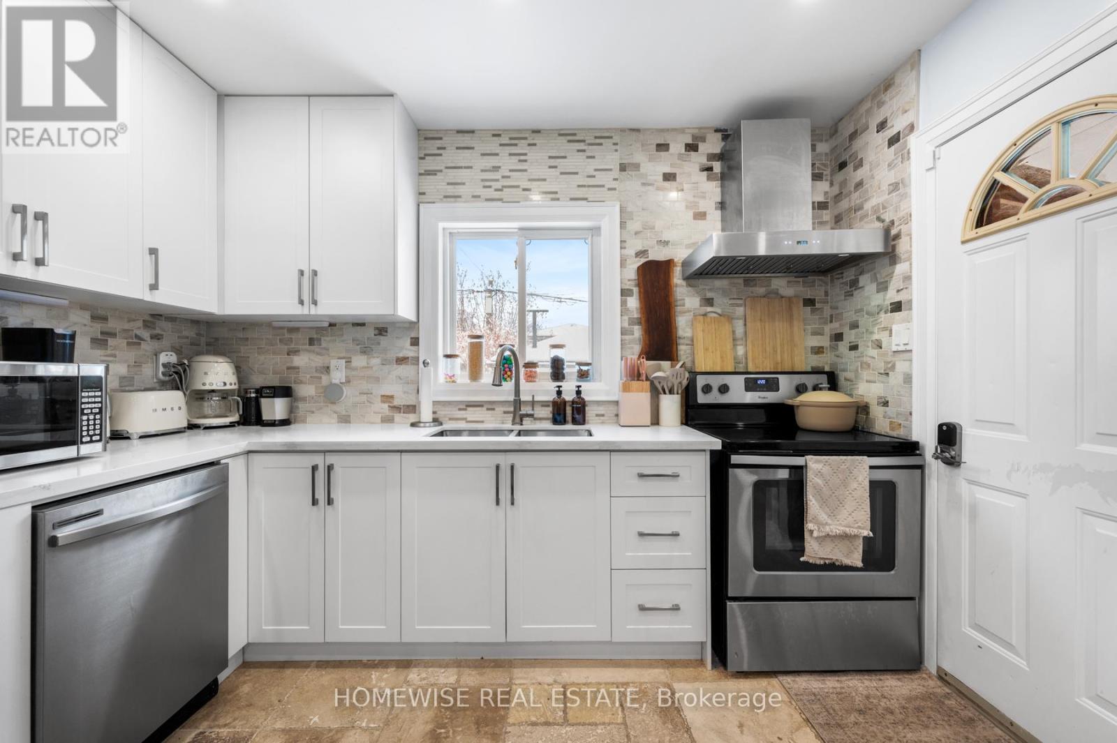 Main - 236 Belgravia Avenue, Toronto, Ontario  M6E 2M8 - Photo 4 - W12636220