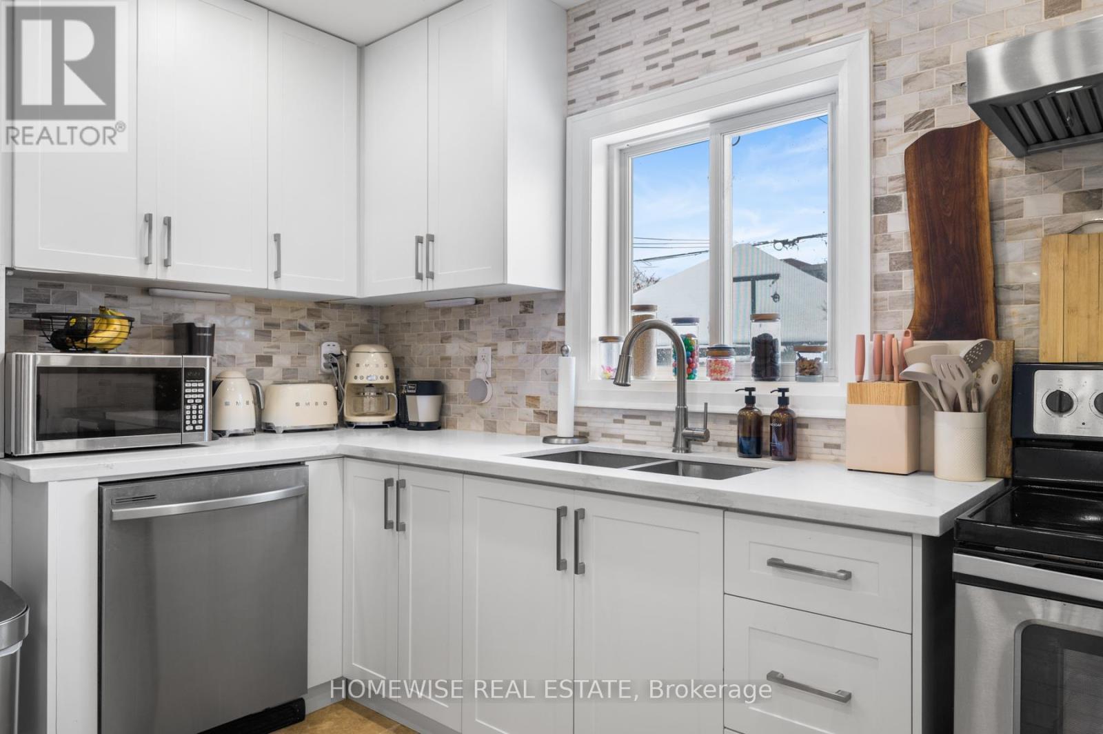 Main - 236 Belgravia Avenue, Toronto, Ontario  M6E 2M8 - Photo 5 - W12636220