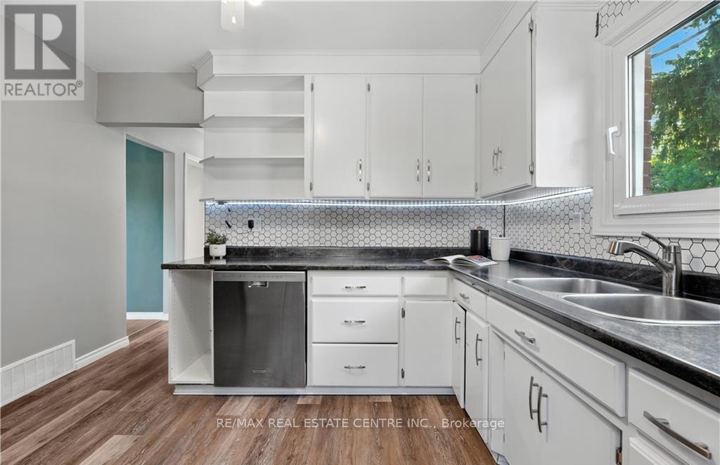 Unit - B - 154 Montgomery Road, Kitchener, Ontario  N2H 3P6 - Photo 5 - X12636362