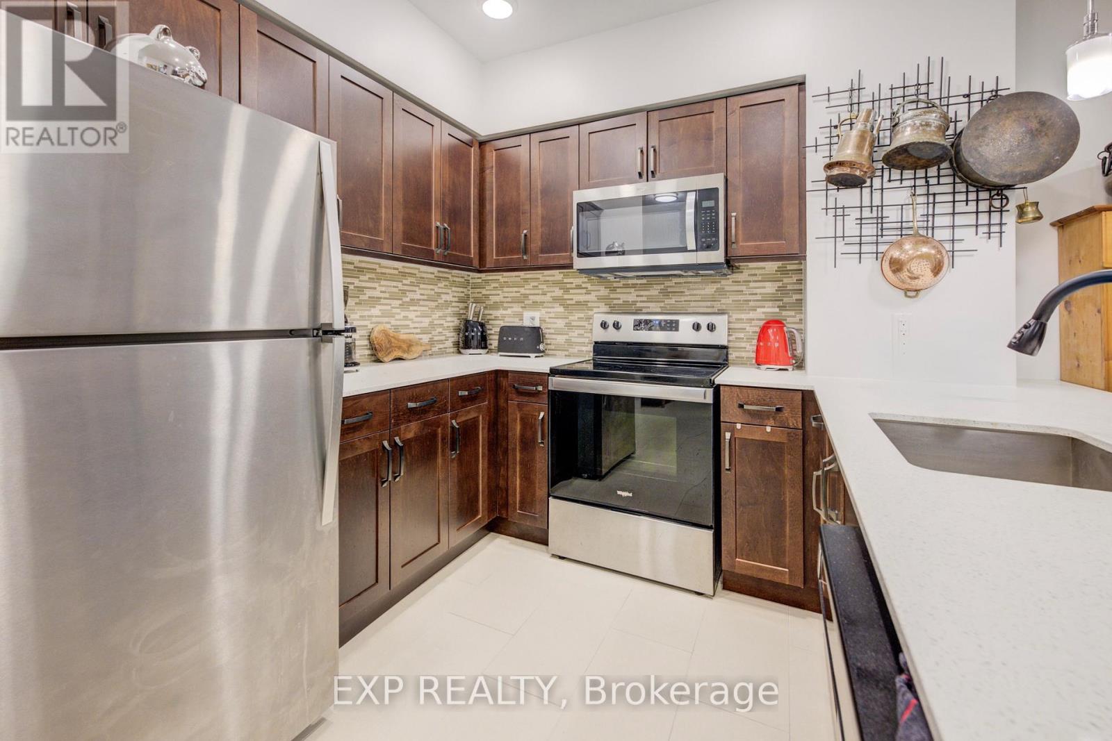 417 - 399 Queen Street S, Kitchener, Ontario N2G 0C4 - Photo 4 - X12636398