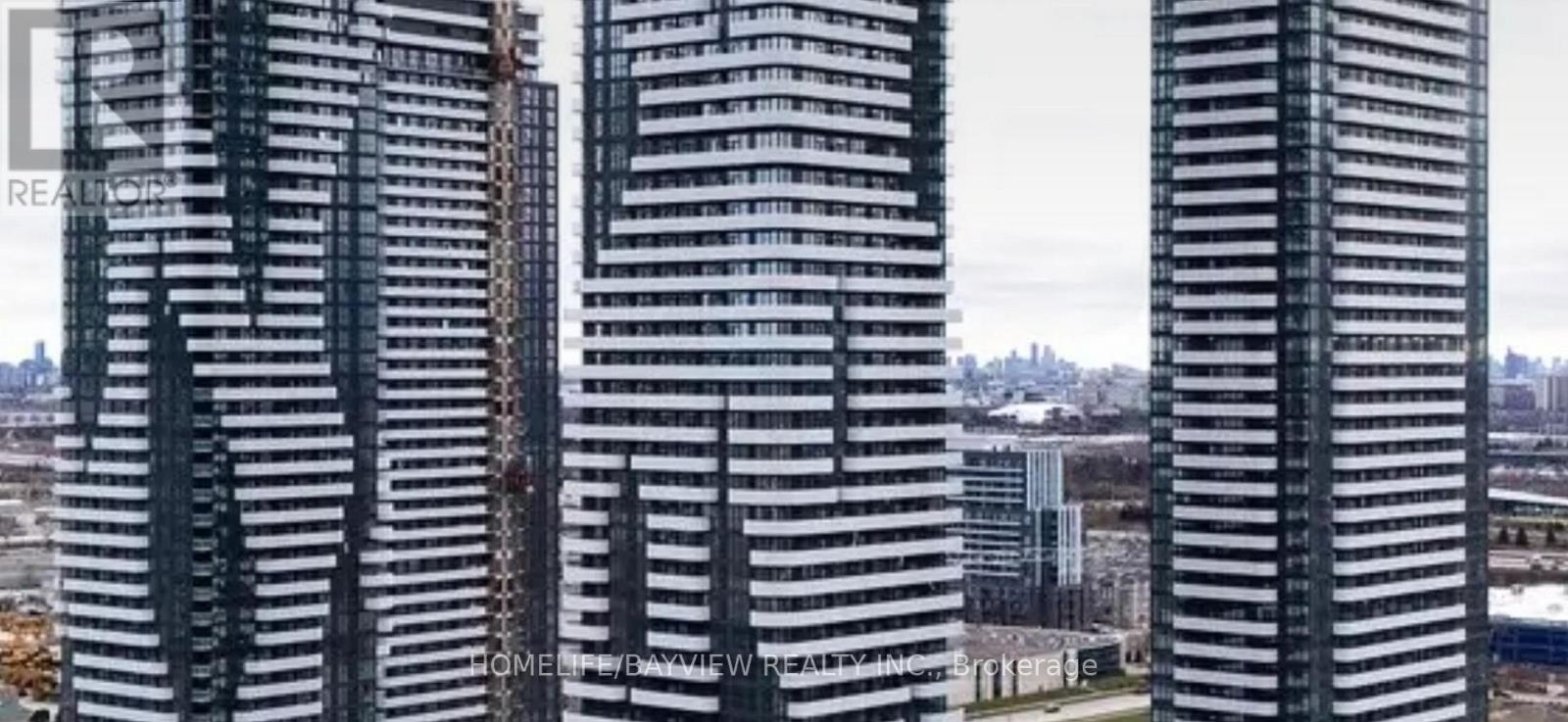 1211 - 8 Interchange Way, Vaughan, Ontario  L4K 4Z7 - Photo 2 - N12636488