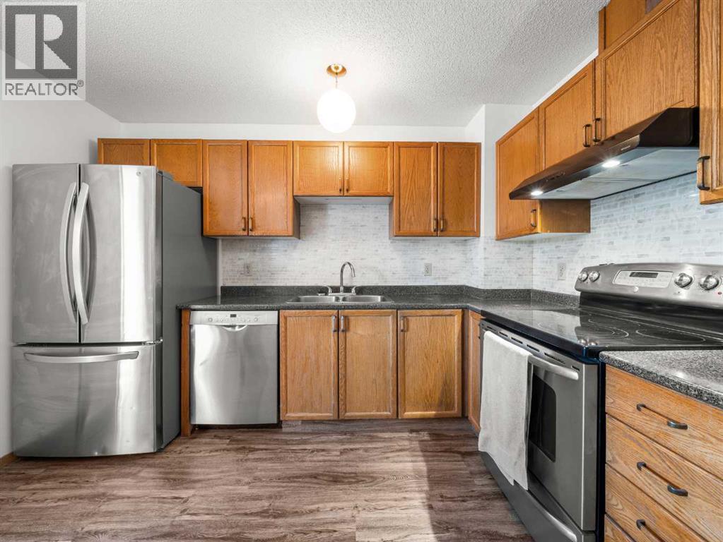 10 Martinbrook Road Ne, Calgary, Alberta  T3J 3G4 - Photo 3 - A2273996