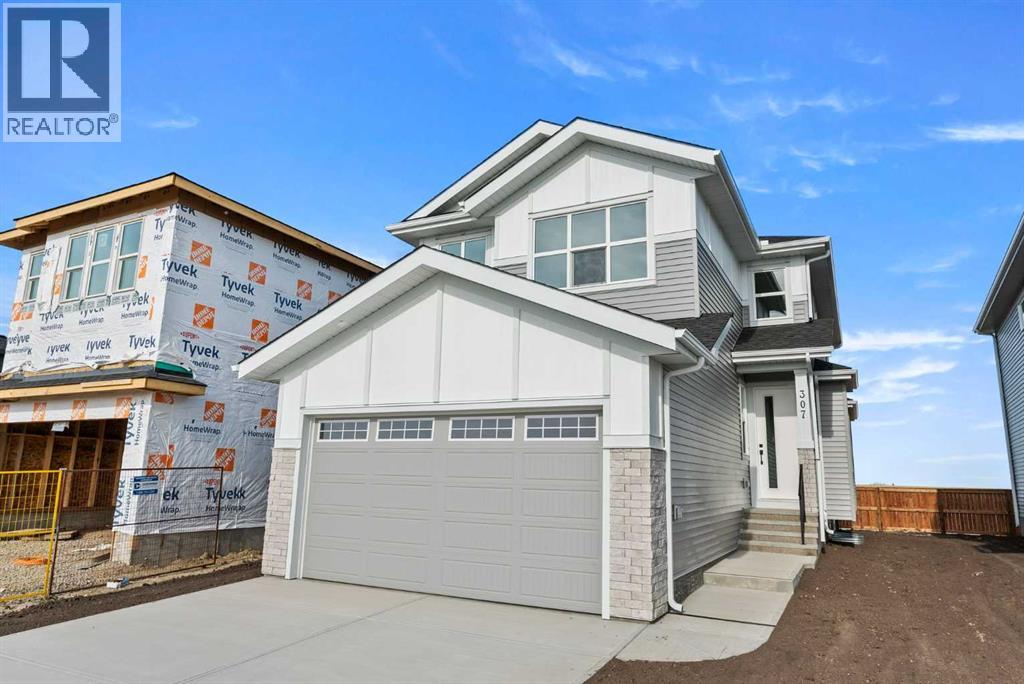 307 Kinniburgh Loop, Chestermere, Alberta  T1X 3C3 - Photo 6 - A2272799