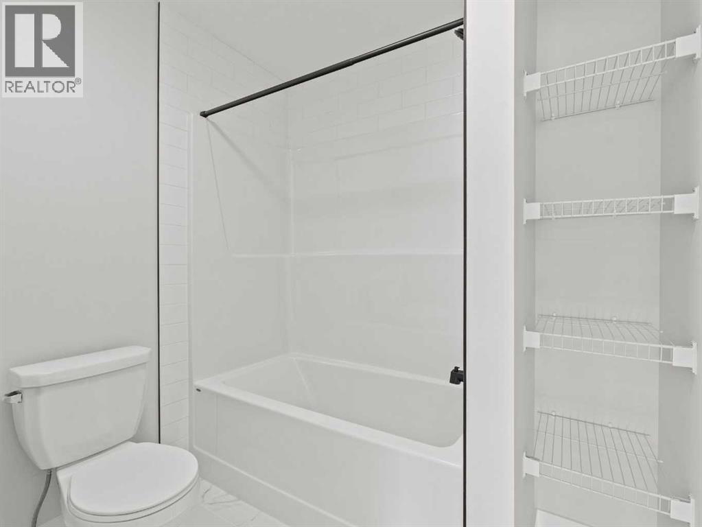 307 Kinniburgh Loop, Chestermere, Alberta  T1X 3C3 - Photo 34 - A2272799