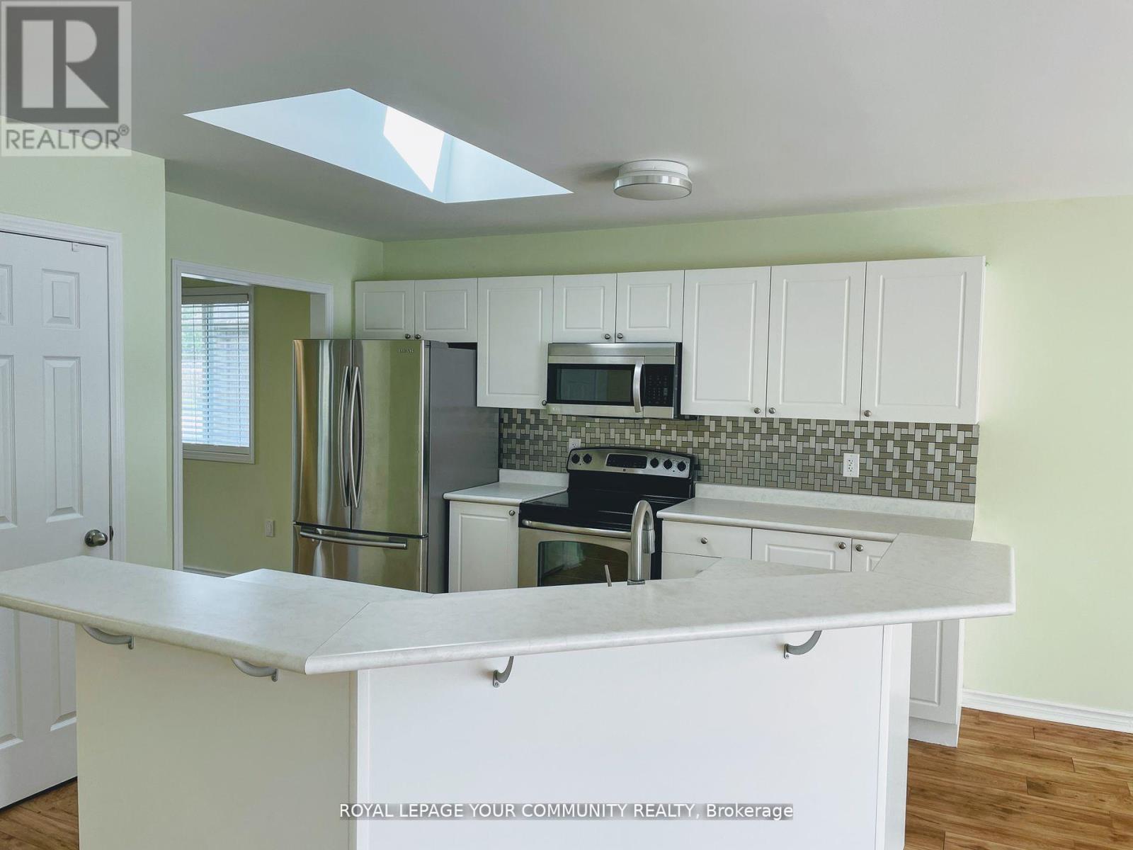 Main Floor - 24 Sun King Crescent, Barrie, Ontario  L4M 7J9 - Photo 9 - S12636828