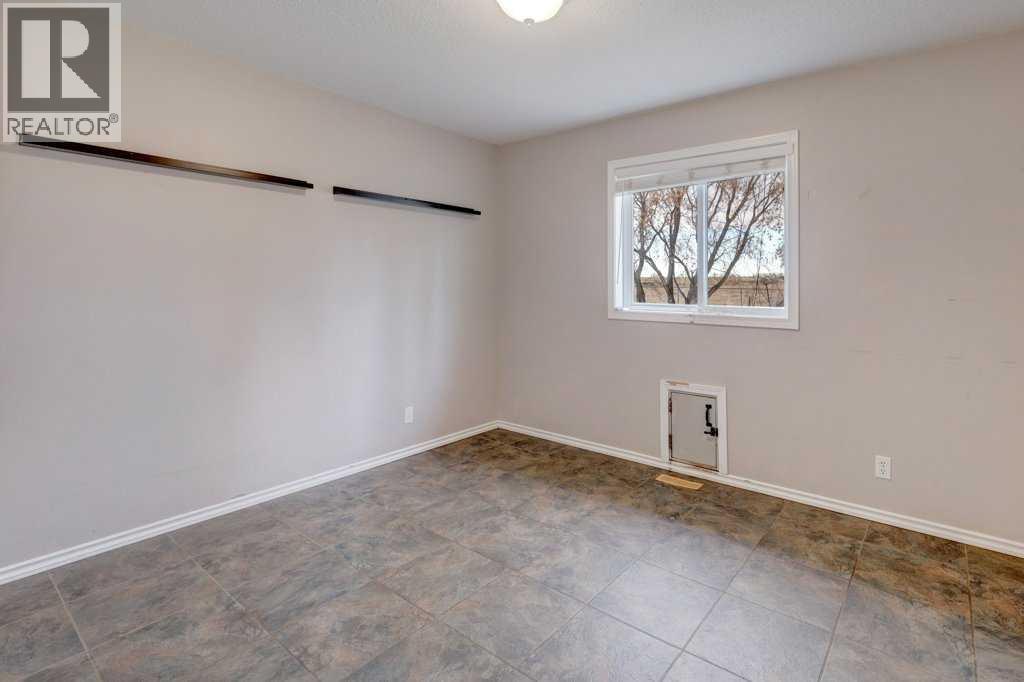 235006 Highway 817, Rural Wheatland County, Alberta  T1P 0Z1 - Photo 21 - A2271430