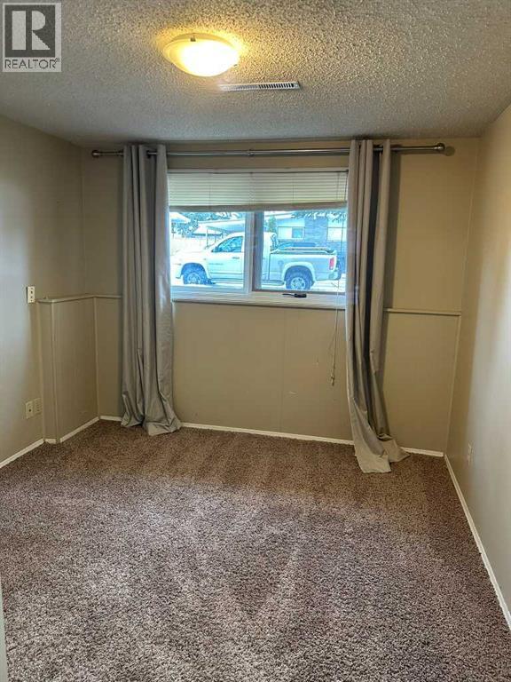 417 Normandy Road S, Lethbridge, Alberta  T1J 3X9 - Photo 6 - A2275413