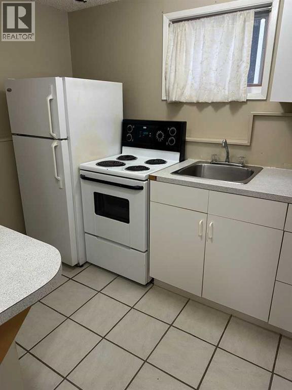 417 Normandy Road S, Lethbridge, Alberta  T1J 3X9 - Photo 4 - A2275413