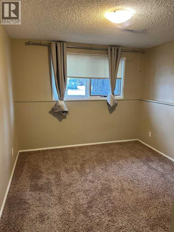 417 Normandy Road S, Lethbridge, Alberta  T1J 3X9 - Photo 7 - A2275413