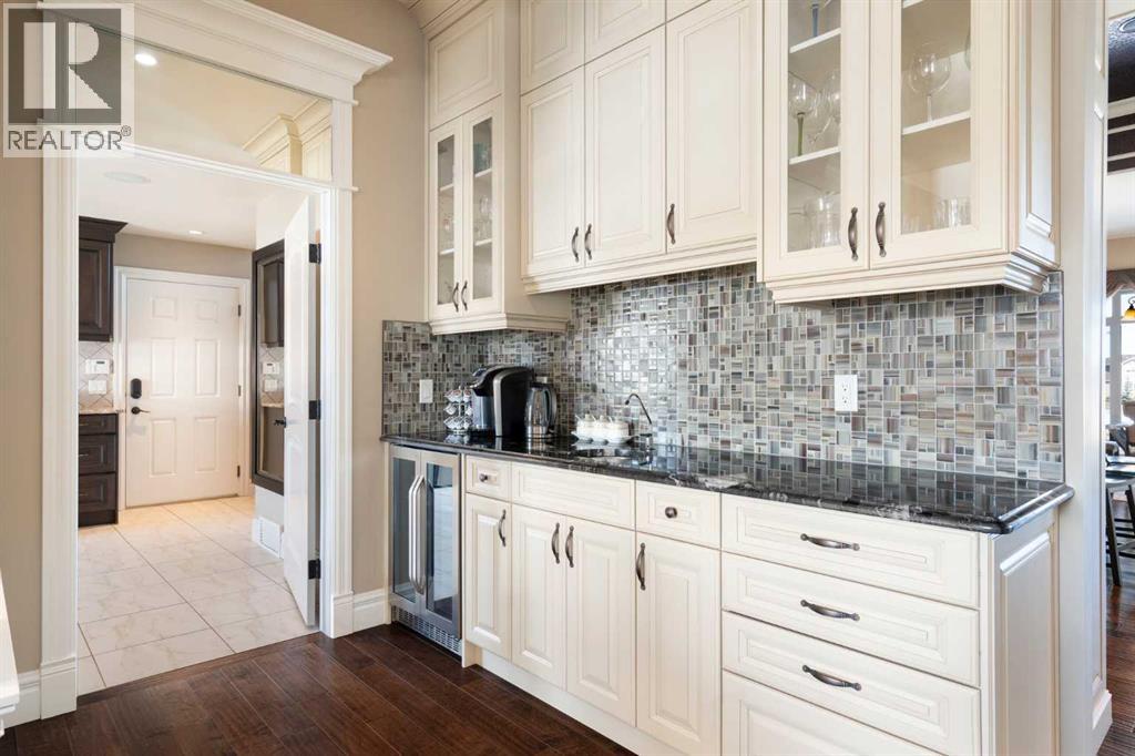 124 Grizzly Rise, Rural Rocky View County, Alberta  T4C 0B5 - Photo 8 - A2211387