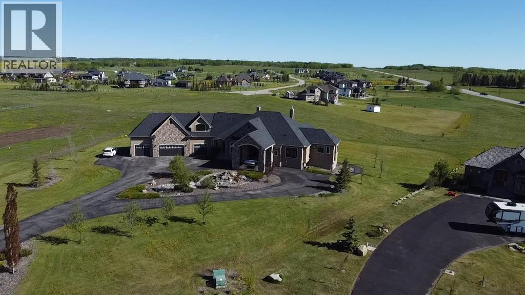 124 Grizzly Rise, Rural Rocky View County, Alberta  T4C 0B5 - Photo 1 - A2211387