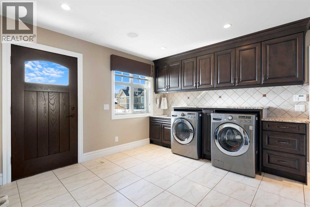 124 Grizzly Rise, Rural Rocky View County, Alberta  T4C 0B5 - Photo 7 - A2211387