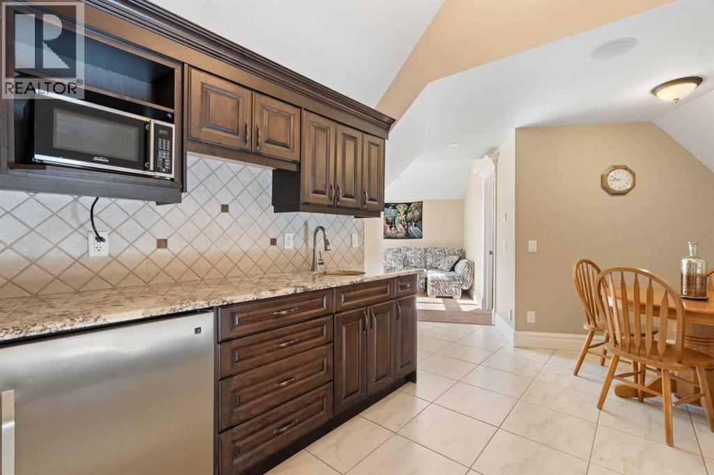 124 Grizzly Rise, Rural Rocky View County, Alberta  T4C 0B5 - Photo 37 - A2211387