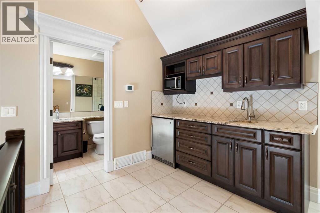 124 Grizzly Rise, Rural Rocky View County, Alberta  T4C 0B5 - Photo 36 - A2211387