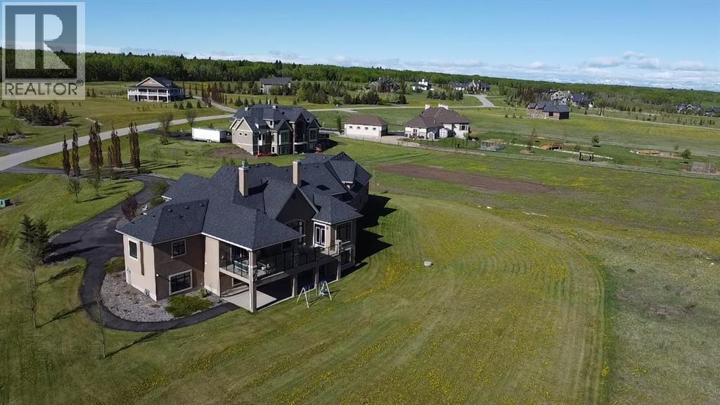 124 Grizzly Rise, Rural Rocky View County, Alberta  T4C 0B5 - Photo 42 - A2211387