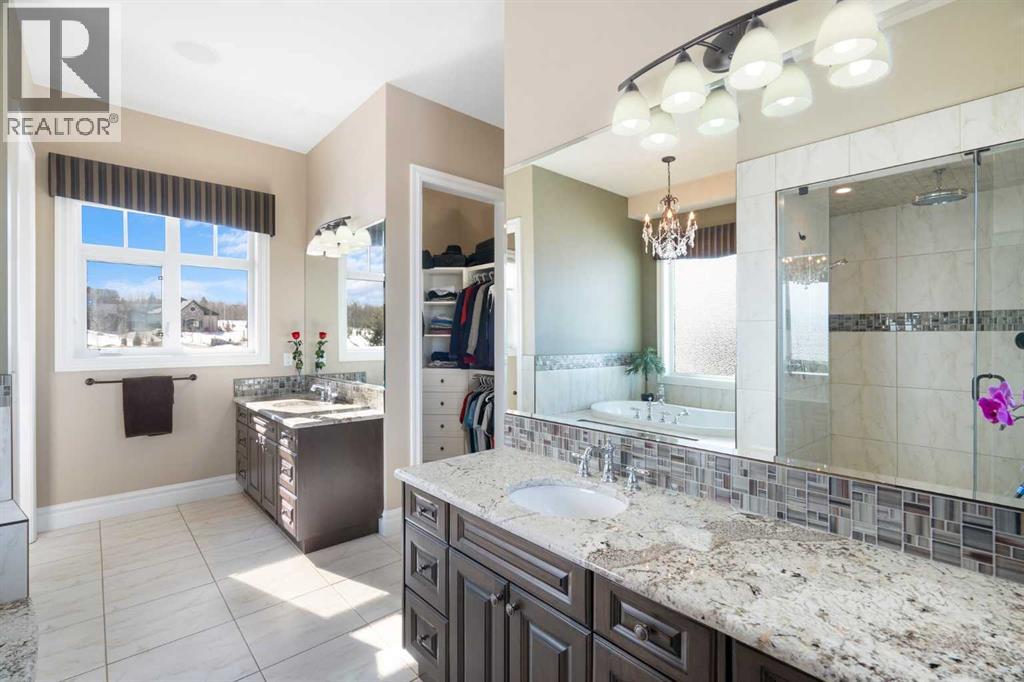 124 Grizzly Rise, Rural Rocky View County, Alberta  T4C 0B5 - Photo 21 - A2211387