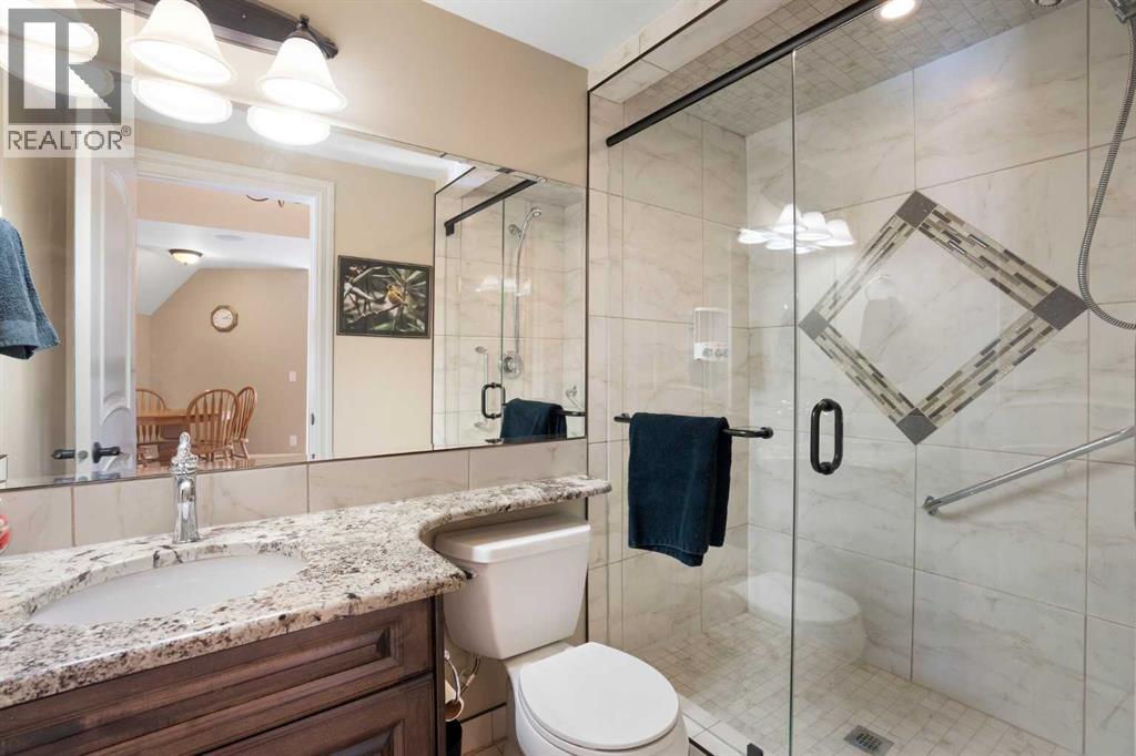 124 Grizzly Rise, Rural Rocky View County, Alberta  T4C 0B5 - Photo 34 - A2211387