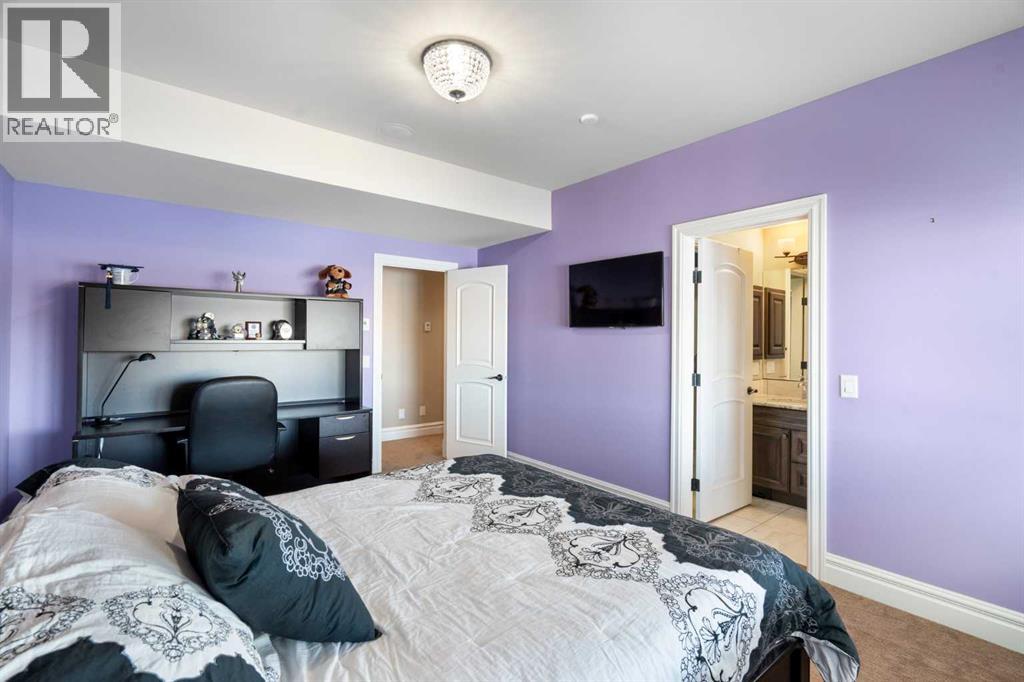 124 Grizzly Rise, Rural Rocky View County, Alberta  T4C 0B5 - Photo 32 - A2211387