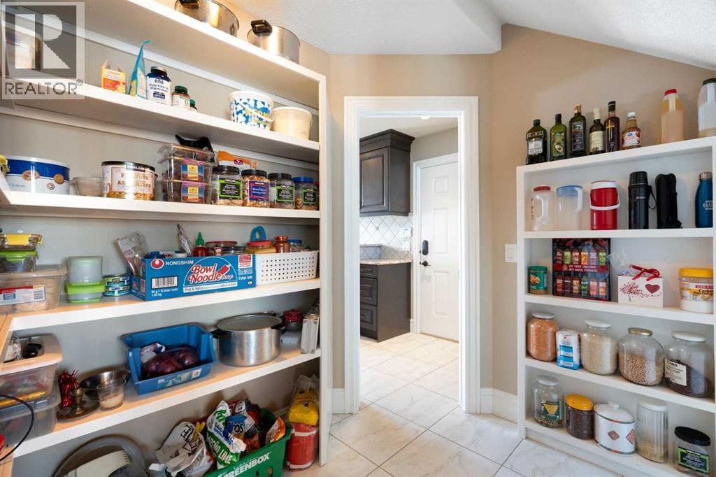 124 Grizzly Rise, Rural Rocky View County, Alberta  T4C 0B5 - Photo 9 - A2211387