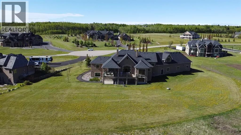 124 Grizzly Rise, Rural Rocky View County, Alberta  T4C 0B5 - Photo 43 - A2211387