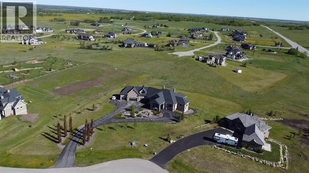 124 Grizzly Rise, Rural Rocky View County, Alberta  T4C 0B5 - Photo 2 - A2211387
