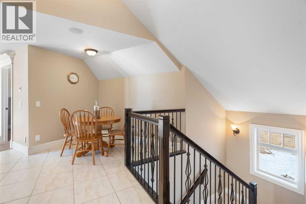 124 Grizzly Rise, Rural Rocky View County, Alberta  T4C 0B5 - Photo 35 - A2211387