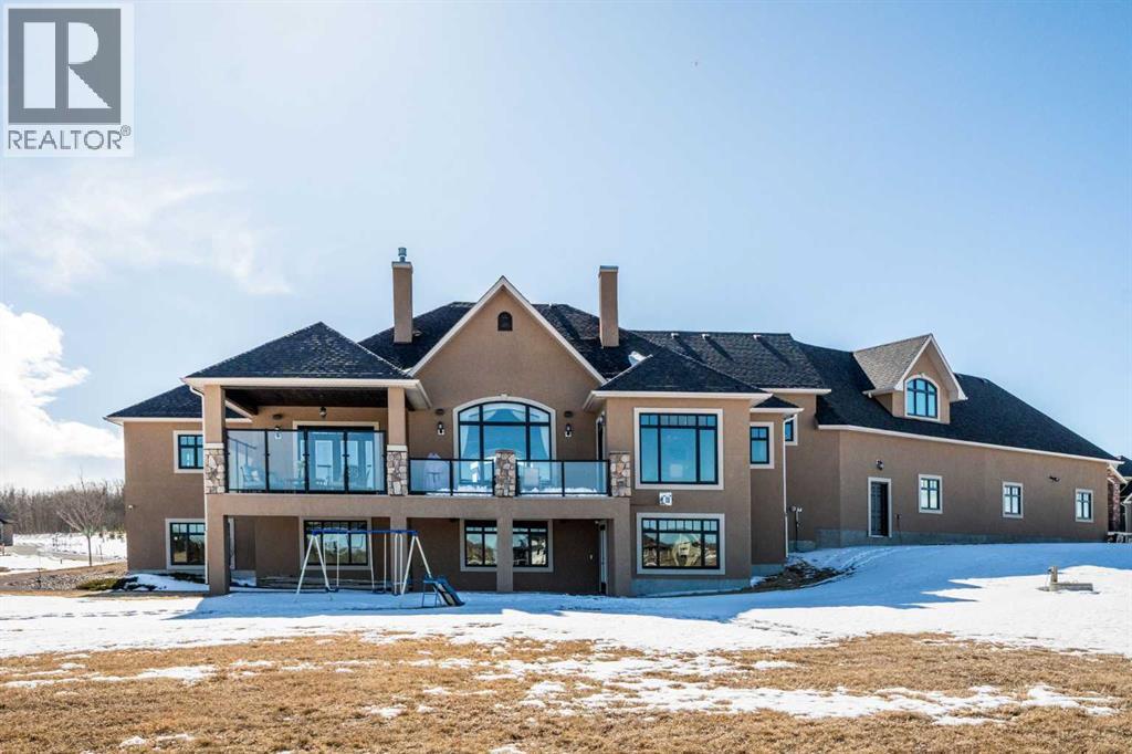 124 Grizzly Rise, Rural Rocky View County, Alberta  T4C 0B5 - Photo 47 - A2211387