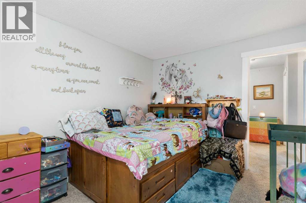 37 Benchlands Drive, Cochrane, Alberta  T4C 1C3 - Photo 27 - A2272679