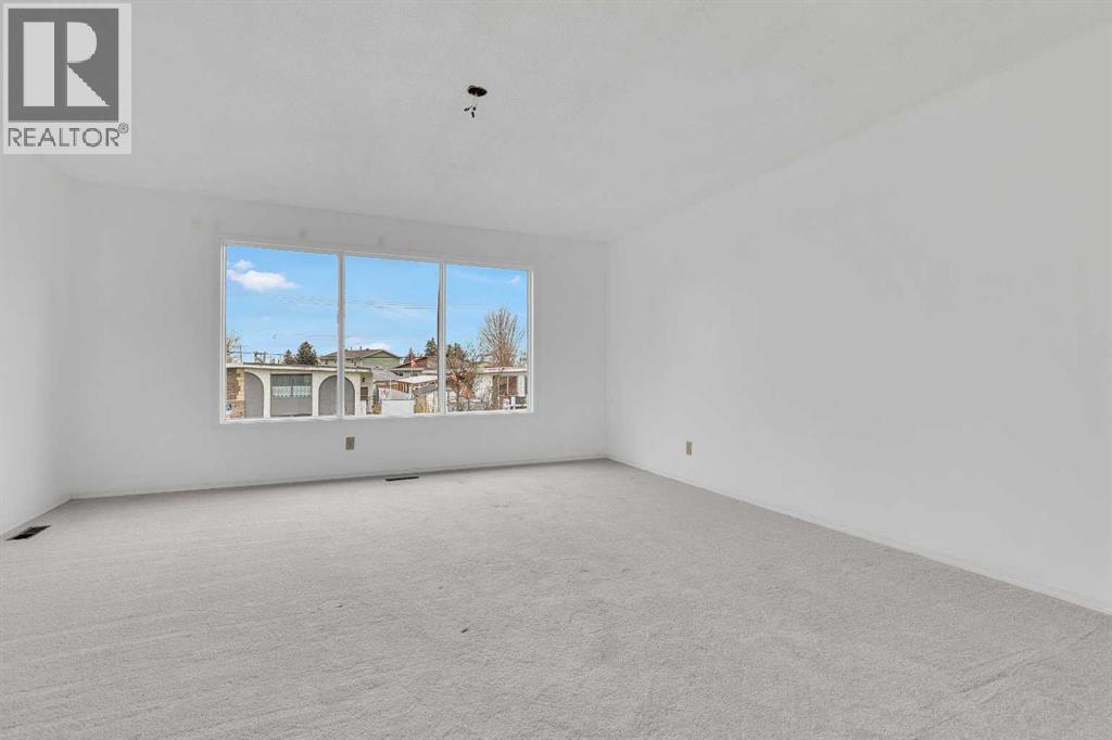 2948 Doverville Crescent Se, Calgary, Alberta  T2B 1T9 - Photo 2 - A2272244