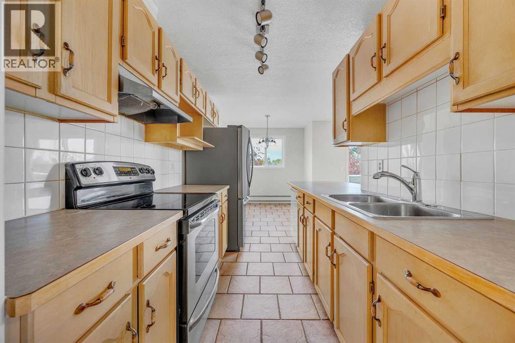 306, 165 Manora Place Ne, Calgary, Alberta  T2A 7X5 - Photo 10 - A2241996