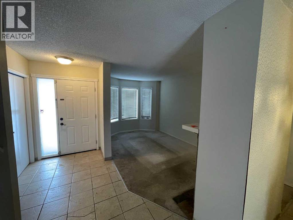 68 Abbeydale Villas Ne, Calgary, Alberta  T2A 7P6 - Photo 3 - A2274582