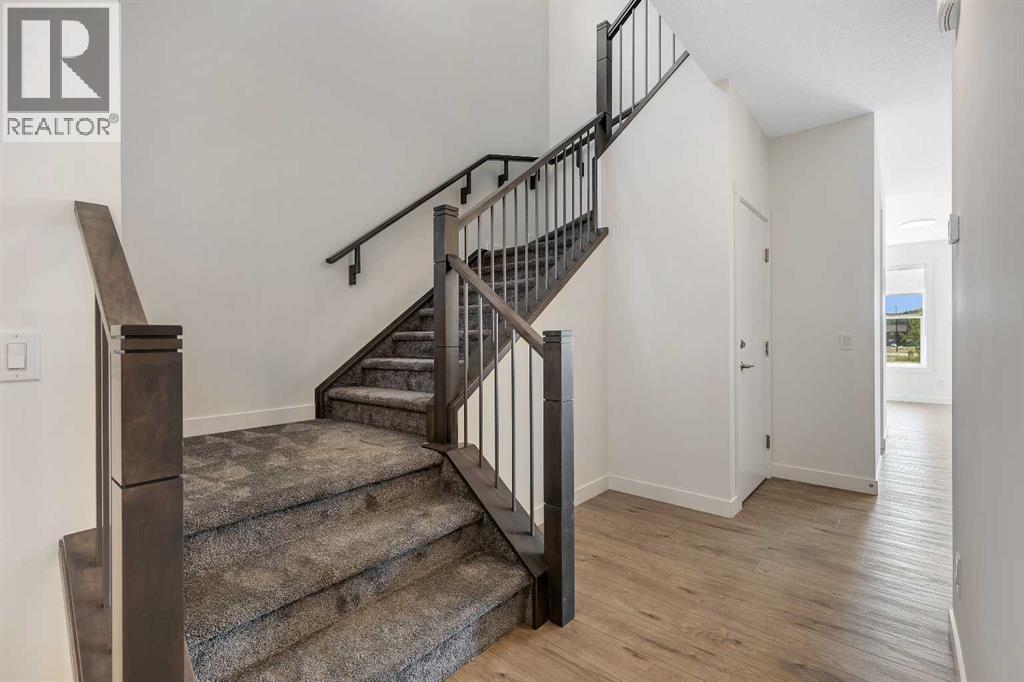 211 Creekstone Row Sw, Calgary, Alberta  T2X 4Y4 - Photo 4 - A2275428