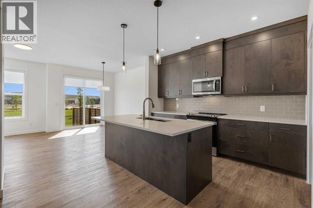 211 Creekstone Row Sw, Calgary, Alberta  T2X 4Y4 - Photo 7 - A2275428