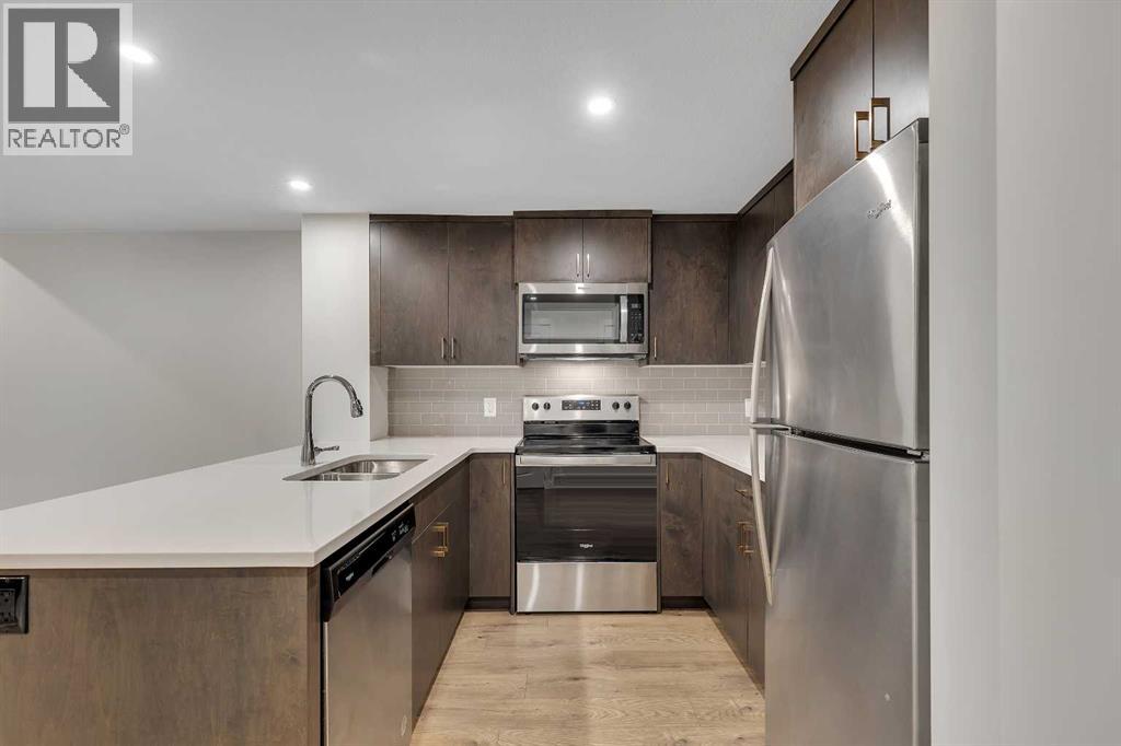 211 Creekstone Row Sw, Calgary, Alberta  T2X 4Y4 - Photo 37 - A2275428